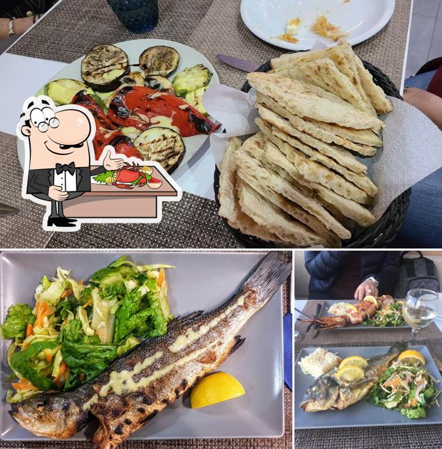 Grilled fish and vegetables served at No Name Grill Restaurant